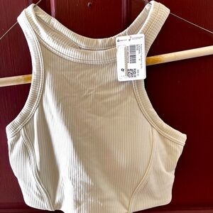 Lululemon Ribbed Nulu High-Neck‎ Yoga Bra in the color bone size